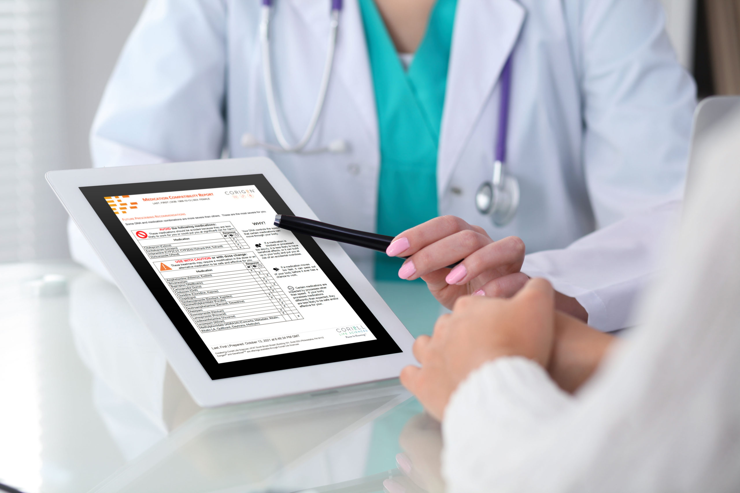 A doctor showing a patient their prescription drug compatibility test on a tablet