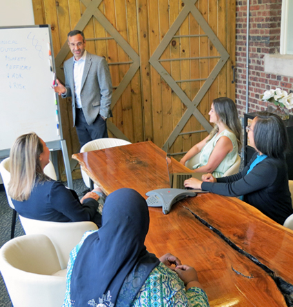 The Coriell Life Sciences team working in a conference room